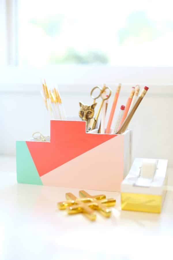 This DIY desk organizer idea is super easy to put together and will hold office supplies you don't want rolling around in a wide open drawer space.