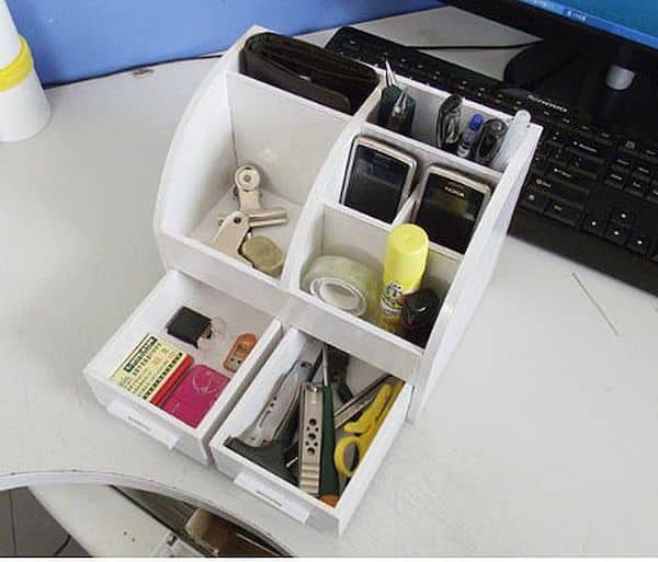 This DIY desk organizer idea is super easy to put together and will hold office supplies you don't want rolling around in a wide open drawer space.