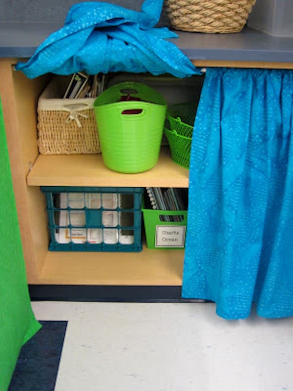 I am talking about tension rods. In case you haven’t realized it before, tension rods can be used a ton of ways in your classroom! Check out this post!