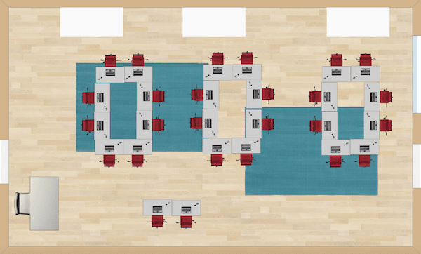 Two desks are positioned front and center for behavior issues or for teacher recognition.  The rest of the desks are in team formations.