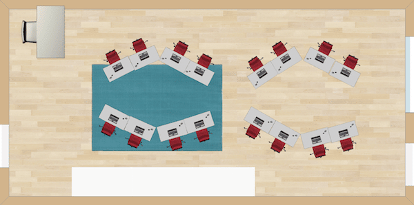 Shaped like a pair of glasses, this seating arrangements veers from the traditional straight lines you often see in the majority of classrooms.  This seating arrangement allows for intimate book discussions or thought-provoking math revelations.